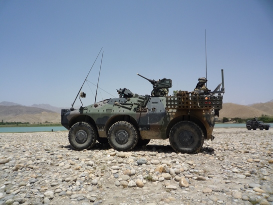 Armoured vehicle on the Surobi lakeside.